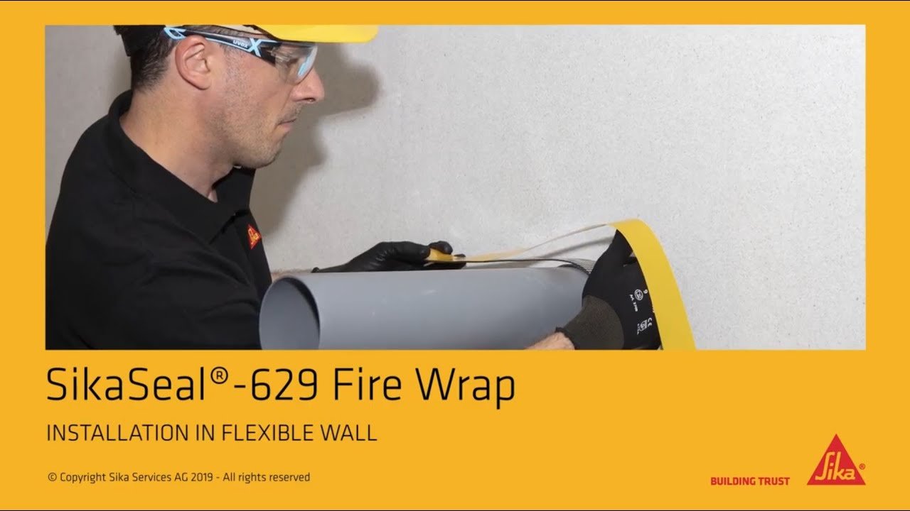 Thi công SikaSeal®-628 Fire Wrap — quấn băng intumescent ống nhựa xuyên tường
